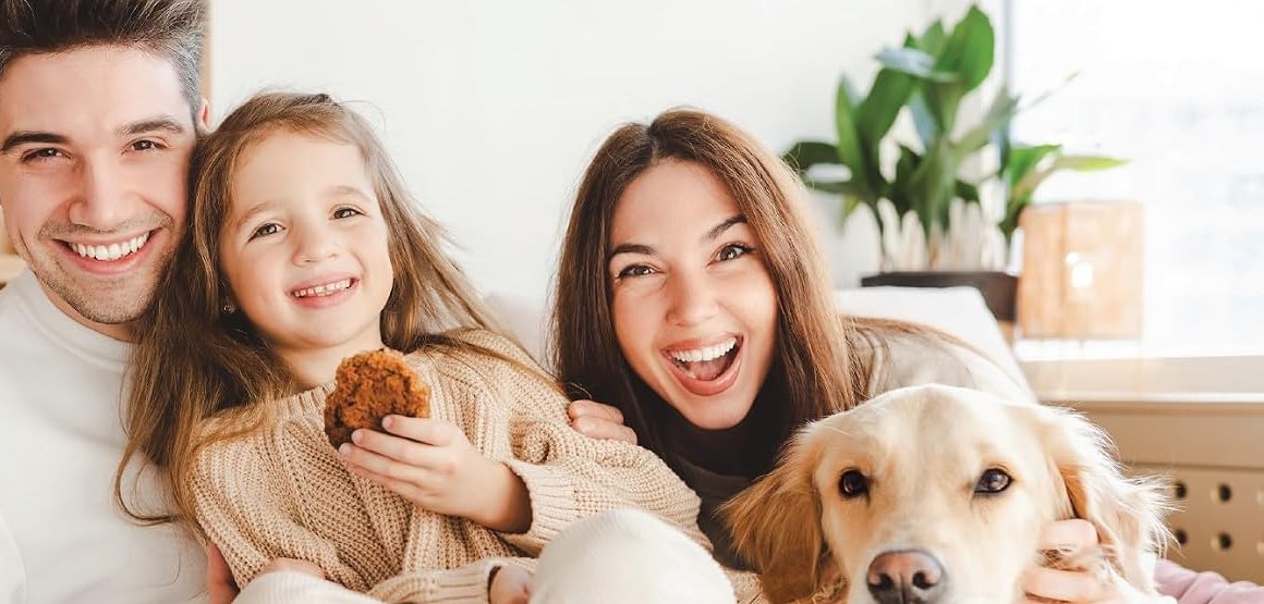 Family at home with their dog